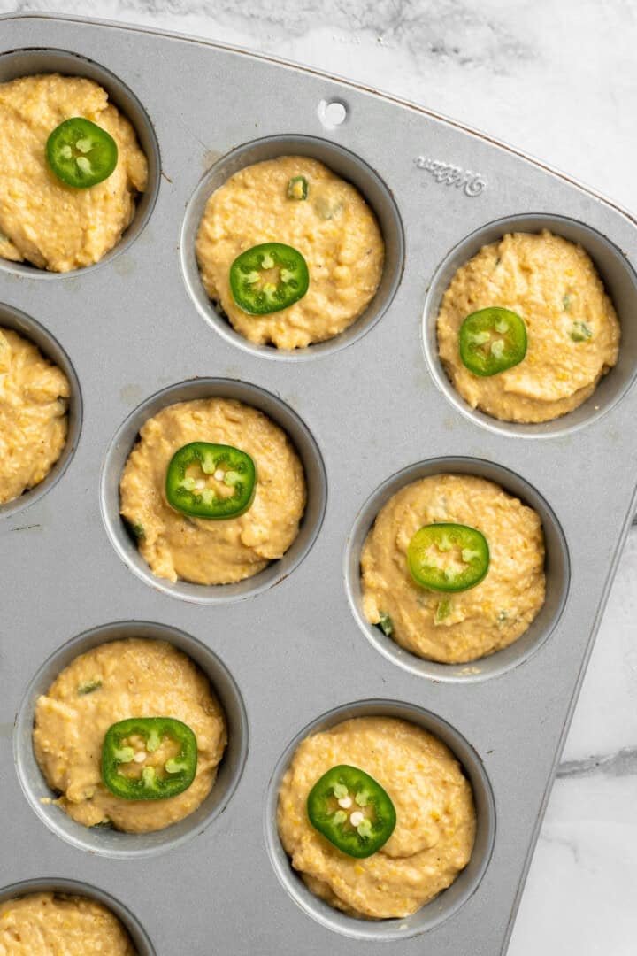 These moist vegan jalapeño cornbread muffins are easy to make and have a gluten-free option, which means everyone can enjoy them! Jalapeño cornbread muffins before baking.