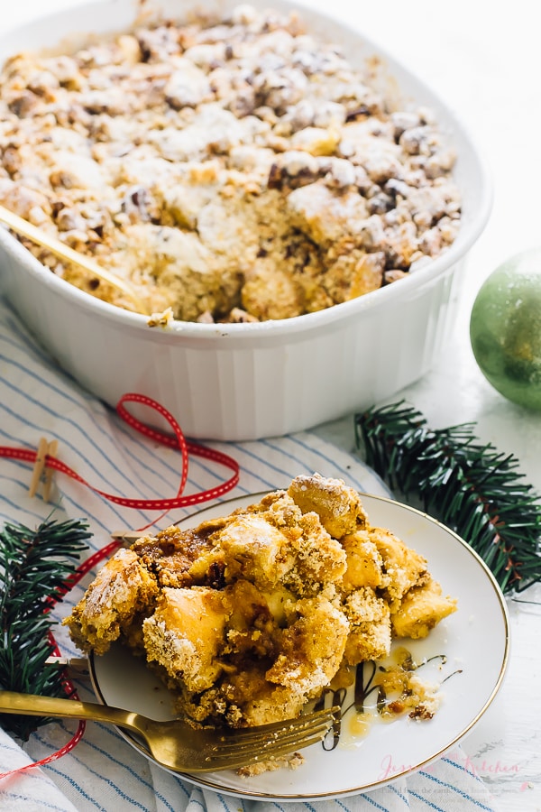 a portion of overnight french toast casserole on a plate and in a baking dish.