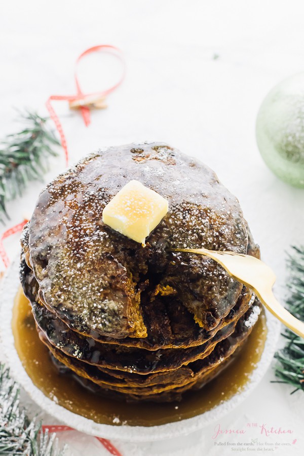 Top down shot of a stack of gingerbread pancakes with a fork digging in. 