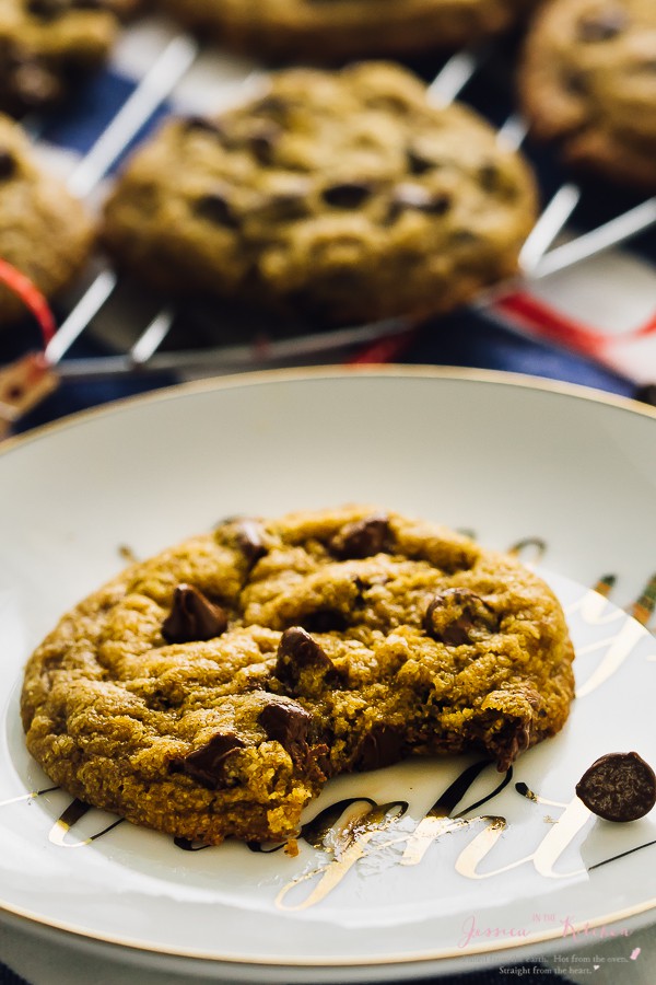 Vegan chocolate chip cookie with a bite taken out. 