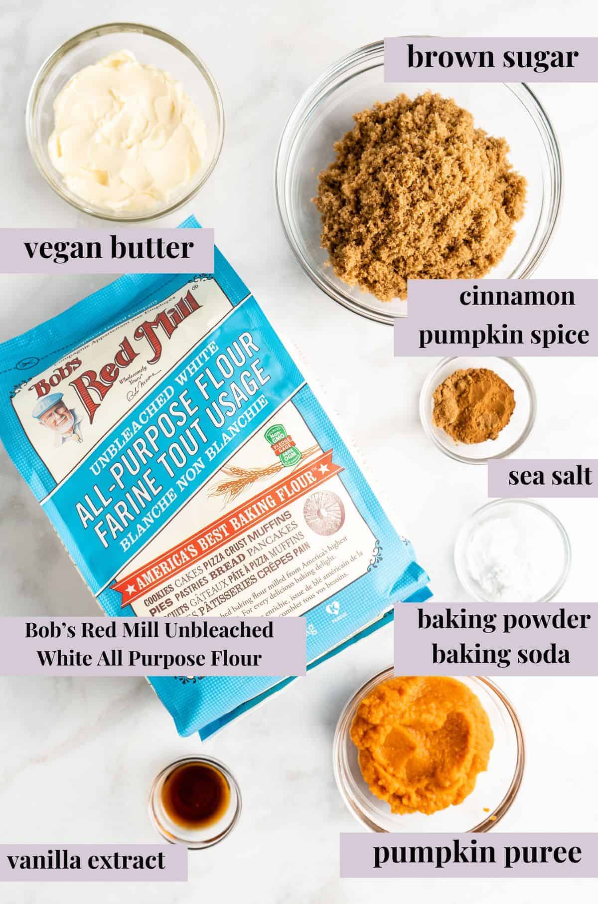 Ingredients for making vegan pumpkin cookies with labels.
