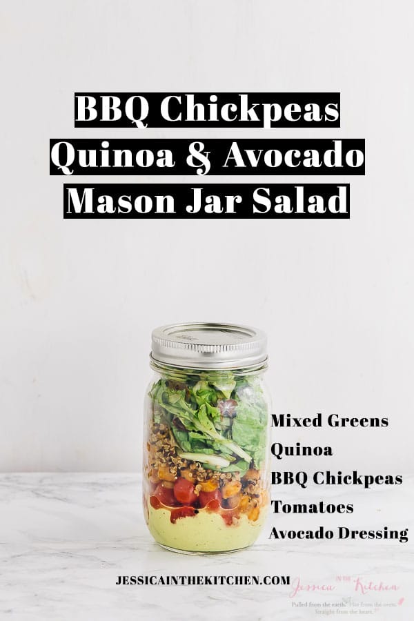 Quinoa salad in a mason jar with text over it. 