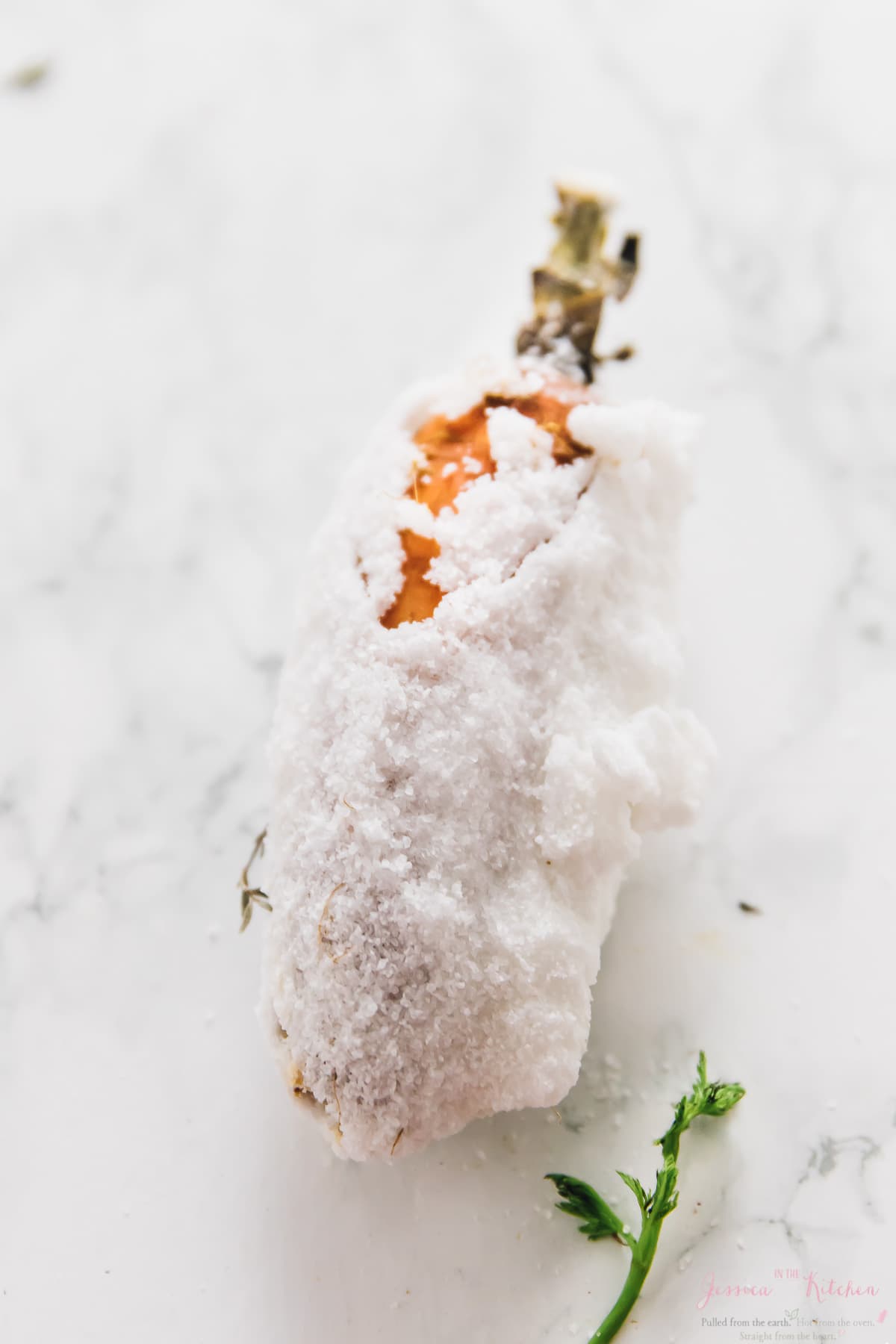 A carrot covered in salt. 