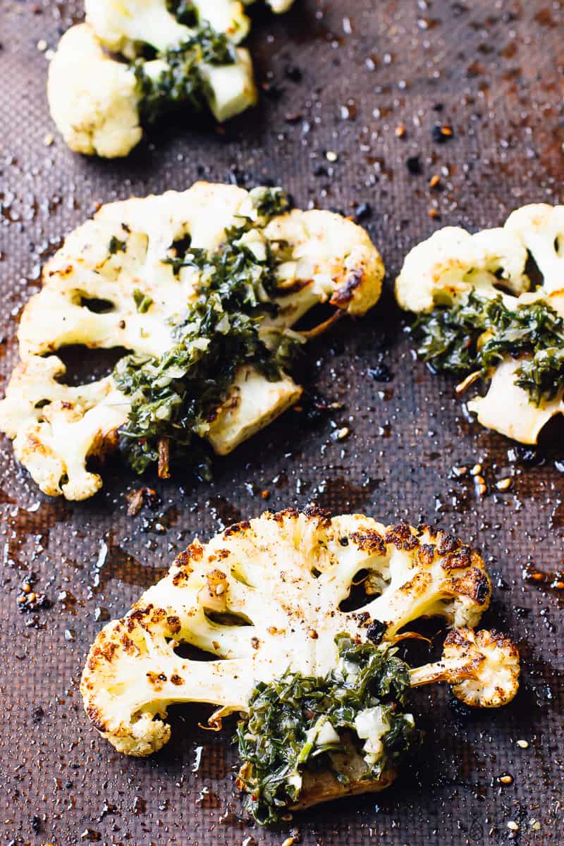 Top down close up of za'atar roasted cauliflower on a baking sheet. 