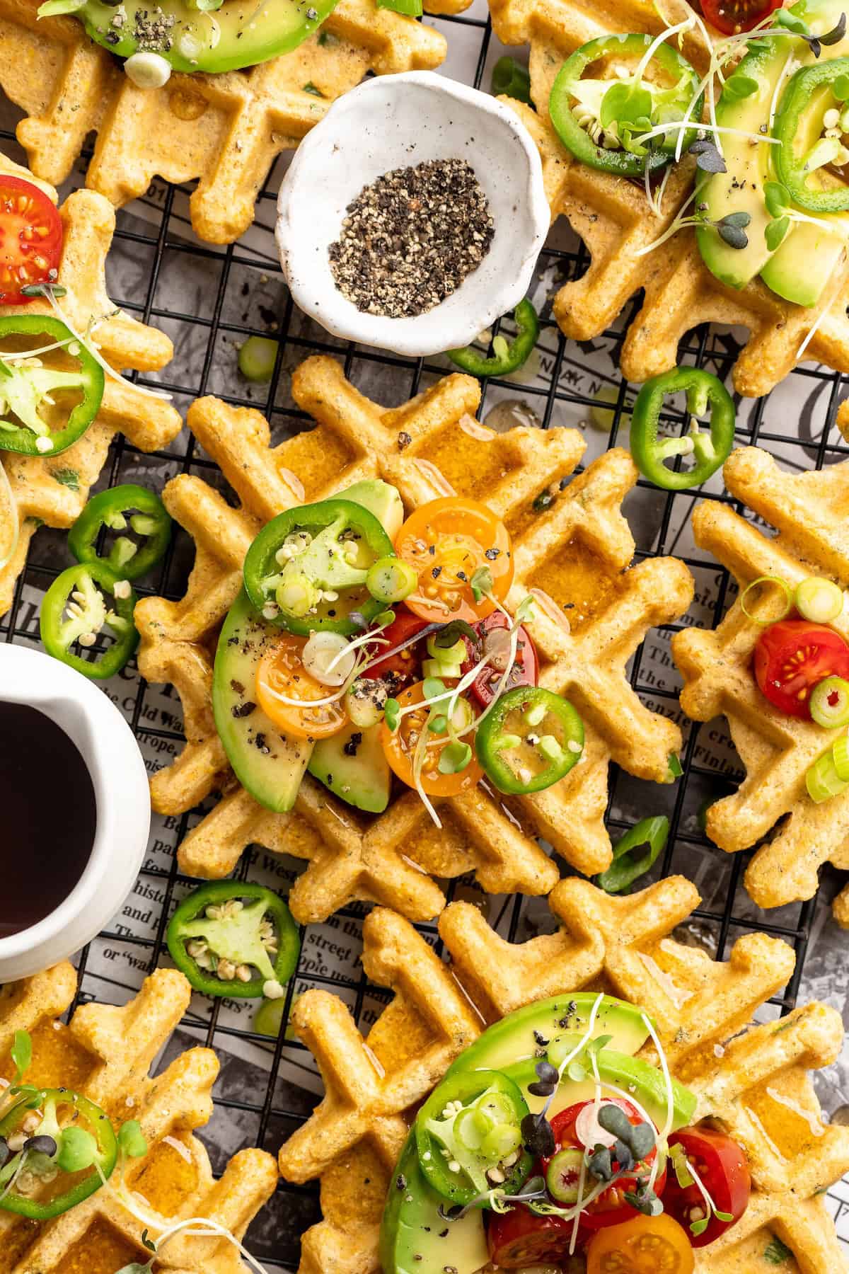 Overhead view of jalapeno cornbread waffles on wire rack