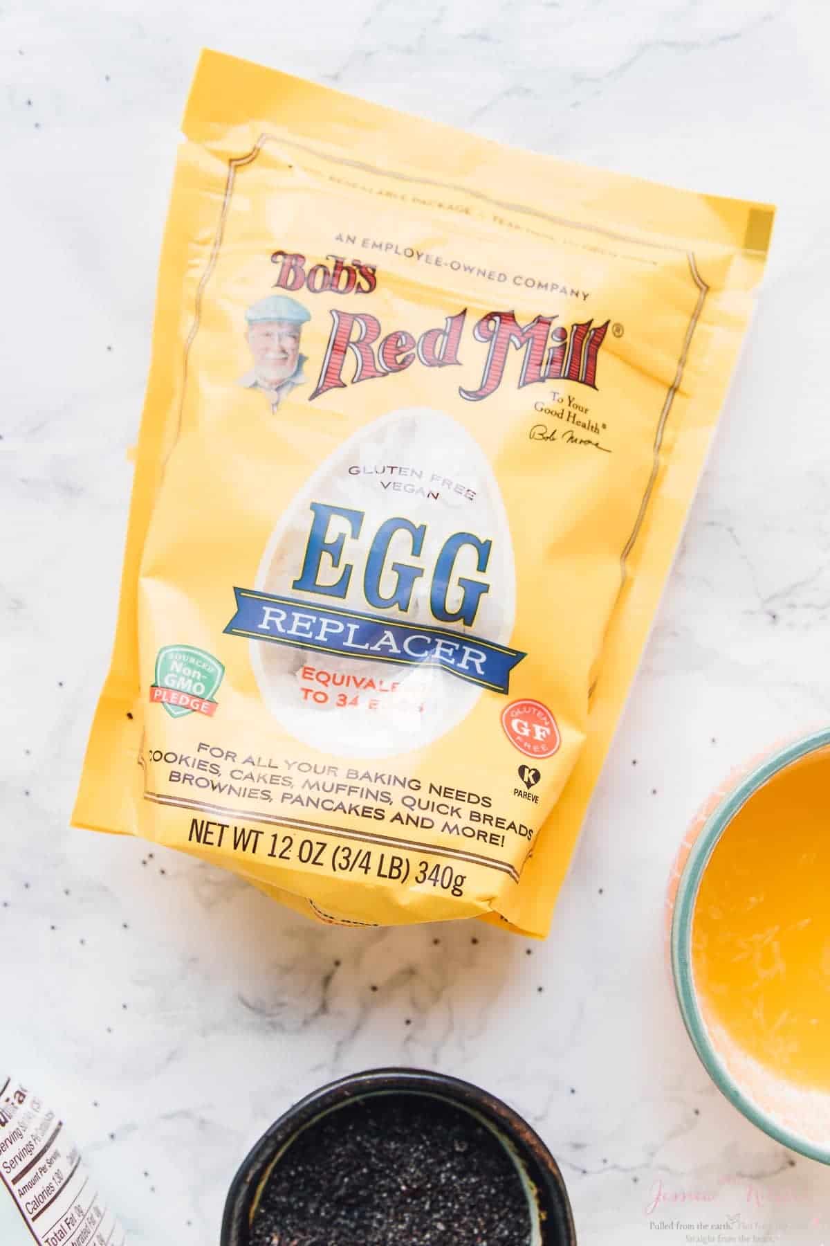 Top down shot of bob's red mill egg replacer in a yellow packet.