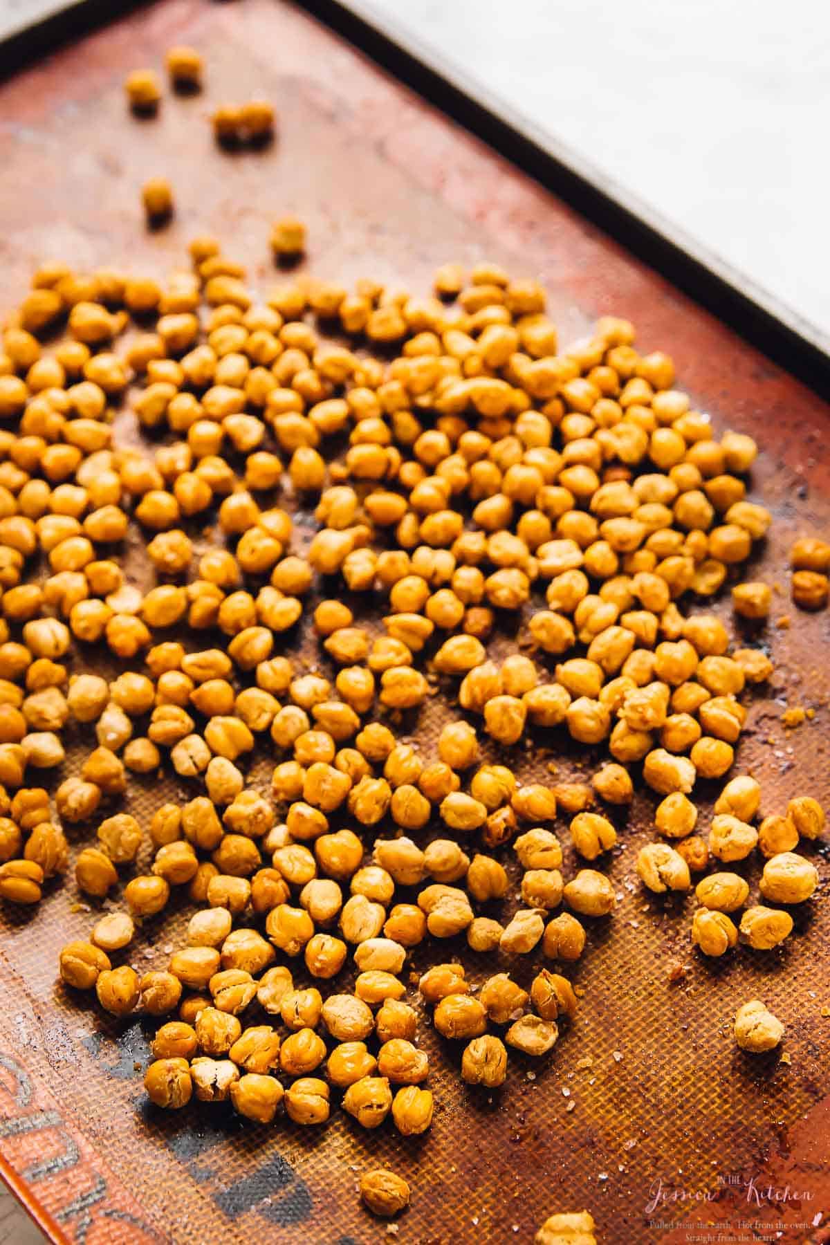 Chickpeas on a baking sheet. 
