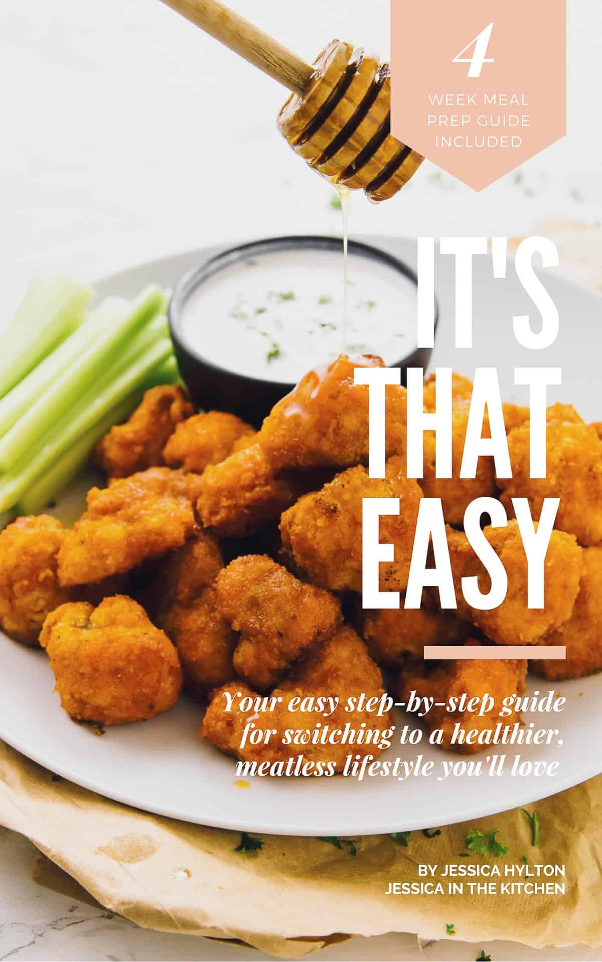 a batch of cauliflower wings with dipping sauce and text over the picture. 