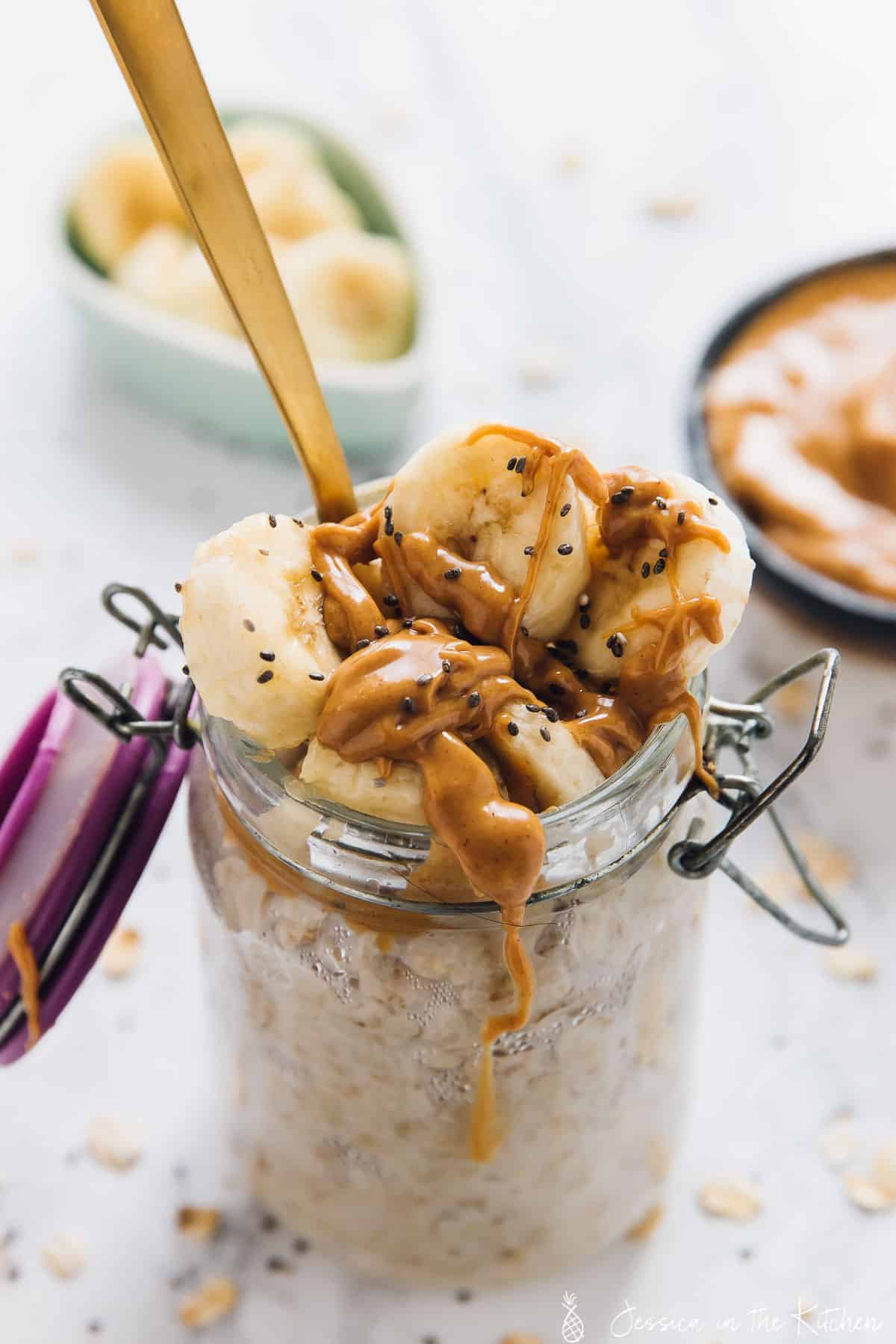 Peanut butter banana overnight oats in a glass jar. 