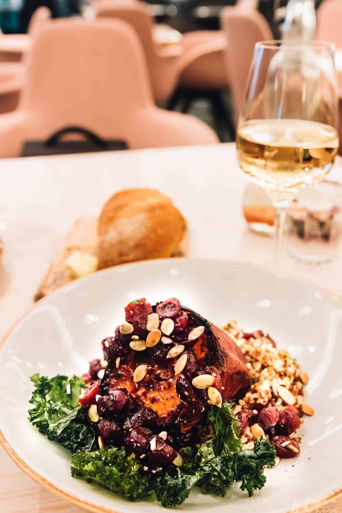 A plate of delicious food on a white plate in a restaurant. 