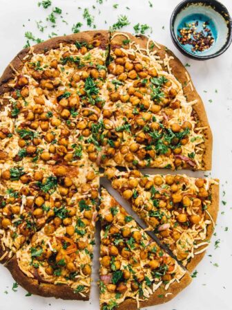Top down view of bbq chickpea pizza slices.
