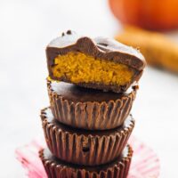 Four chocolate cups stacked on top of each other.