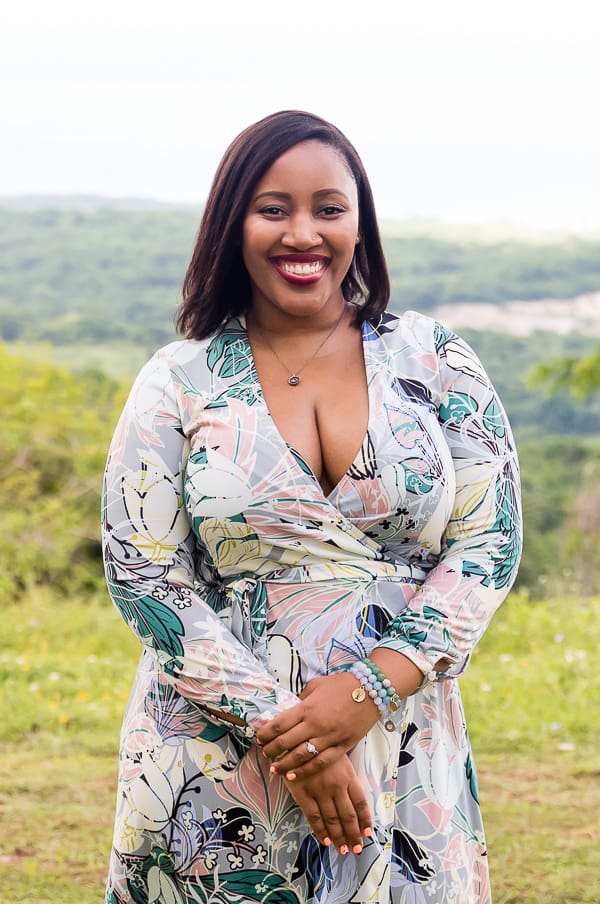 Jessica outdoors, smiling to camera.