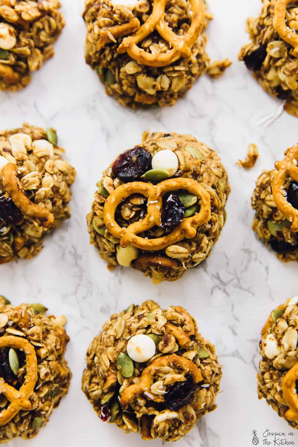 Overhead view of peanut butter banana oatmeal cookies with pretzels
