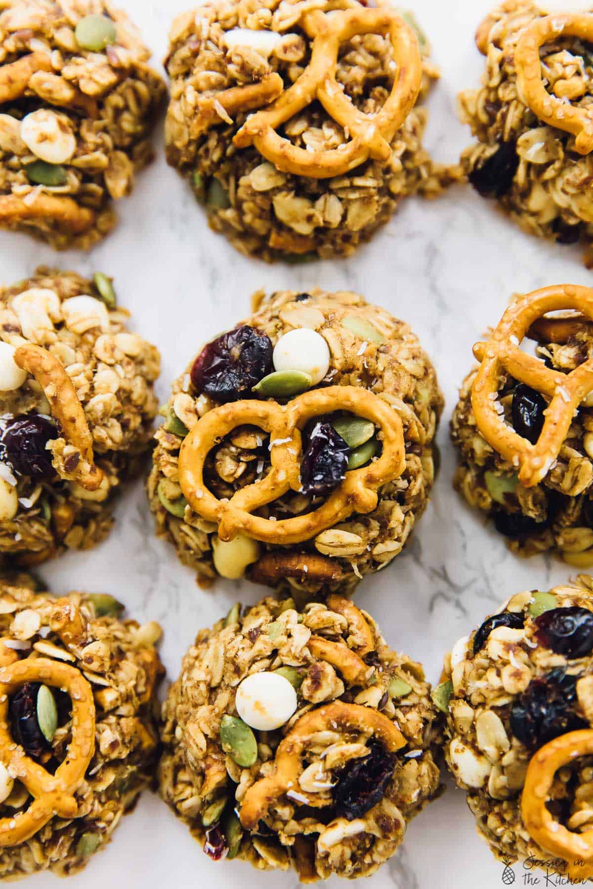 Overhead view of peanut butter banana oatmeal cookies with pretzels