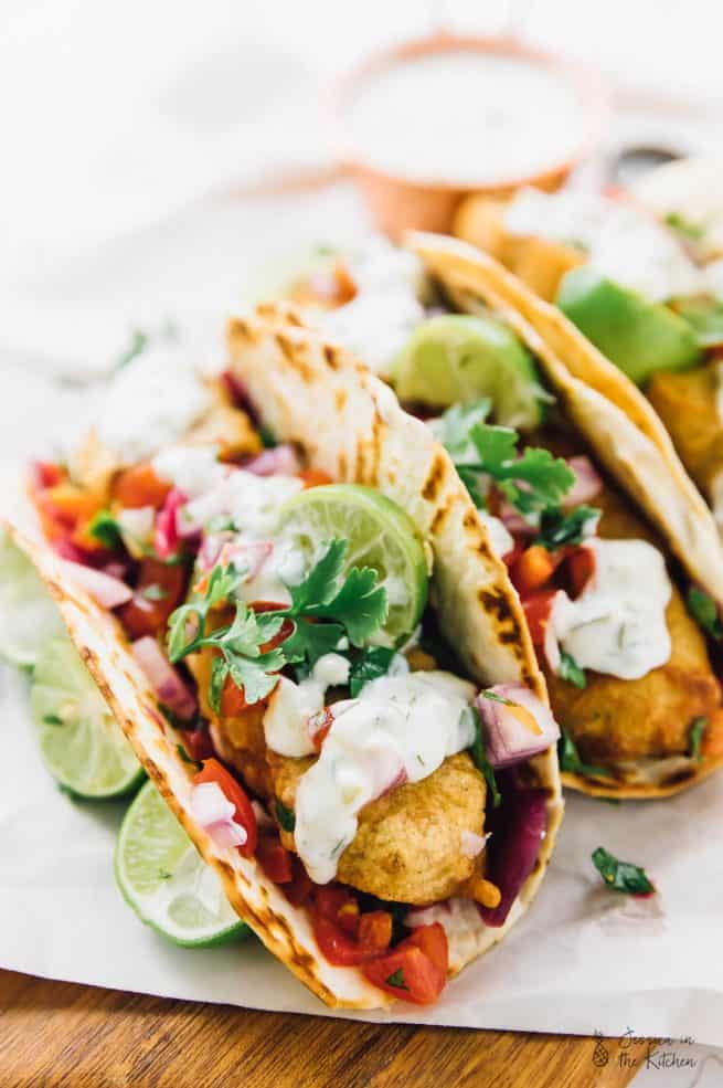 This Vegan Fish Tacos are a real vegan treat!! A beer-battered crust, a crunchy slaw and a creamy tartar sauce make for the ultimate vegan taco experience! via https://jessicainthekitchen.com