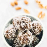 No bake coconut lemon energy bites in a bowl.