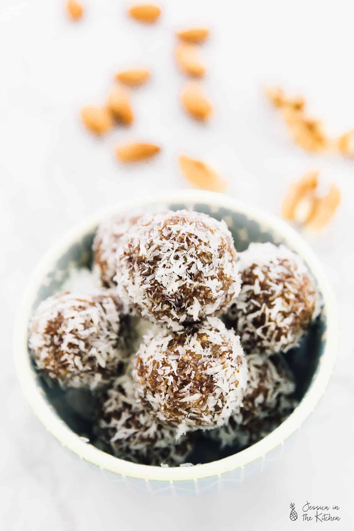 No bake coconut lemon energy bites in a bowl. 