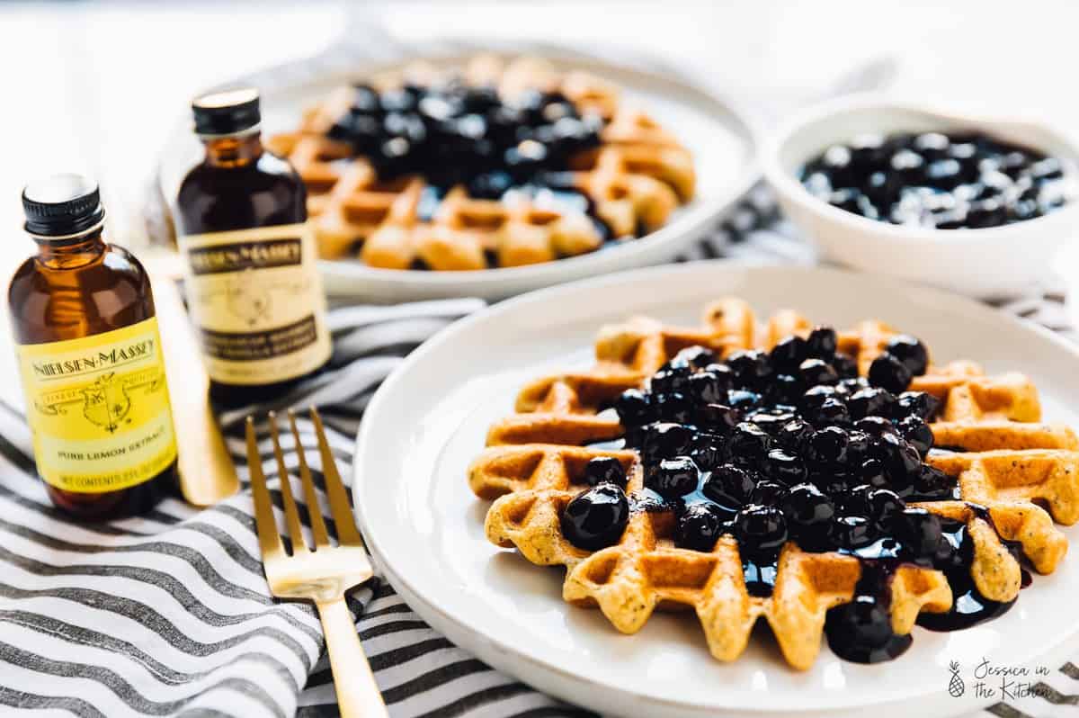 Lemon poppyseed waffles, topped with blueberry sauce. 