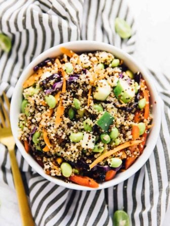 This 15 Minute Asian Quinoa Salad is loaded with so much flavour! It's a colour vegan meal perfect for a light but filling lunch or dinner and is dressed with a divine sesame ginger sauce!! via https://jessicainthekitchen.com via https://jessicainthekitchen.com #veganrecipes #vegans #vegetarians #recipes #plantbased #veganmeal #meals #healthy #breakfast #veganlife #veganeating