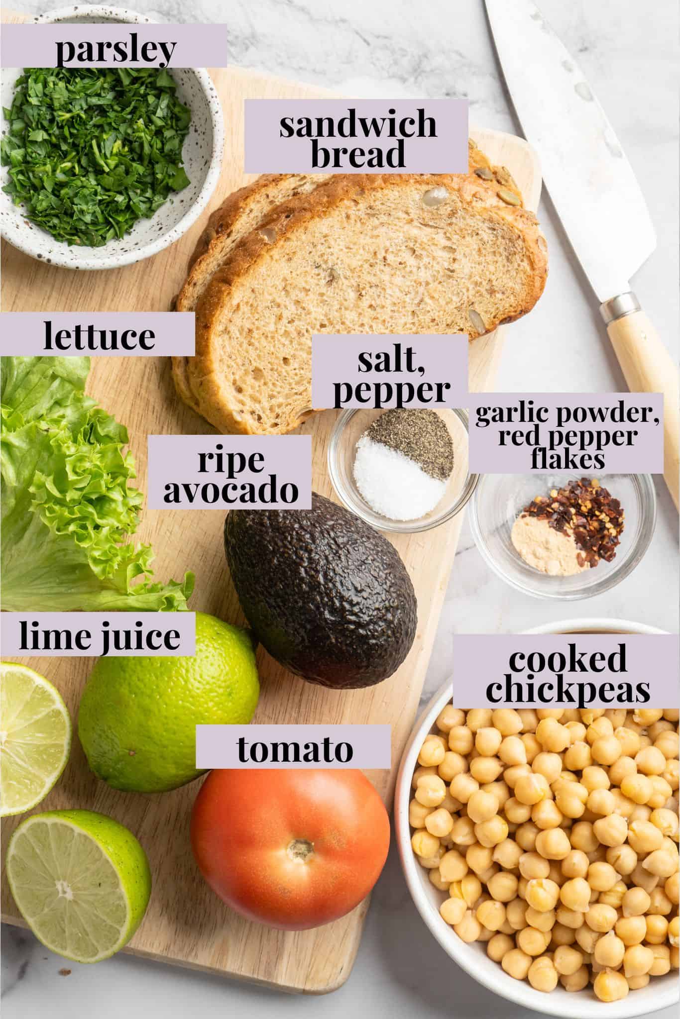 Overhead view of ingredients for smashed chickpea avocado salad sandwich