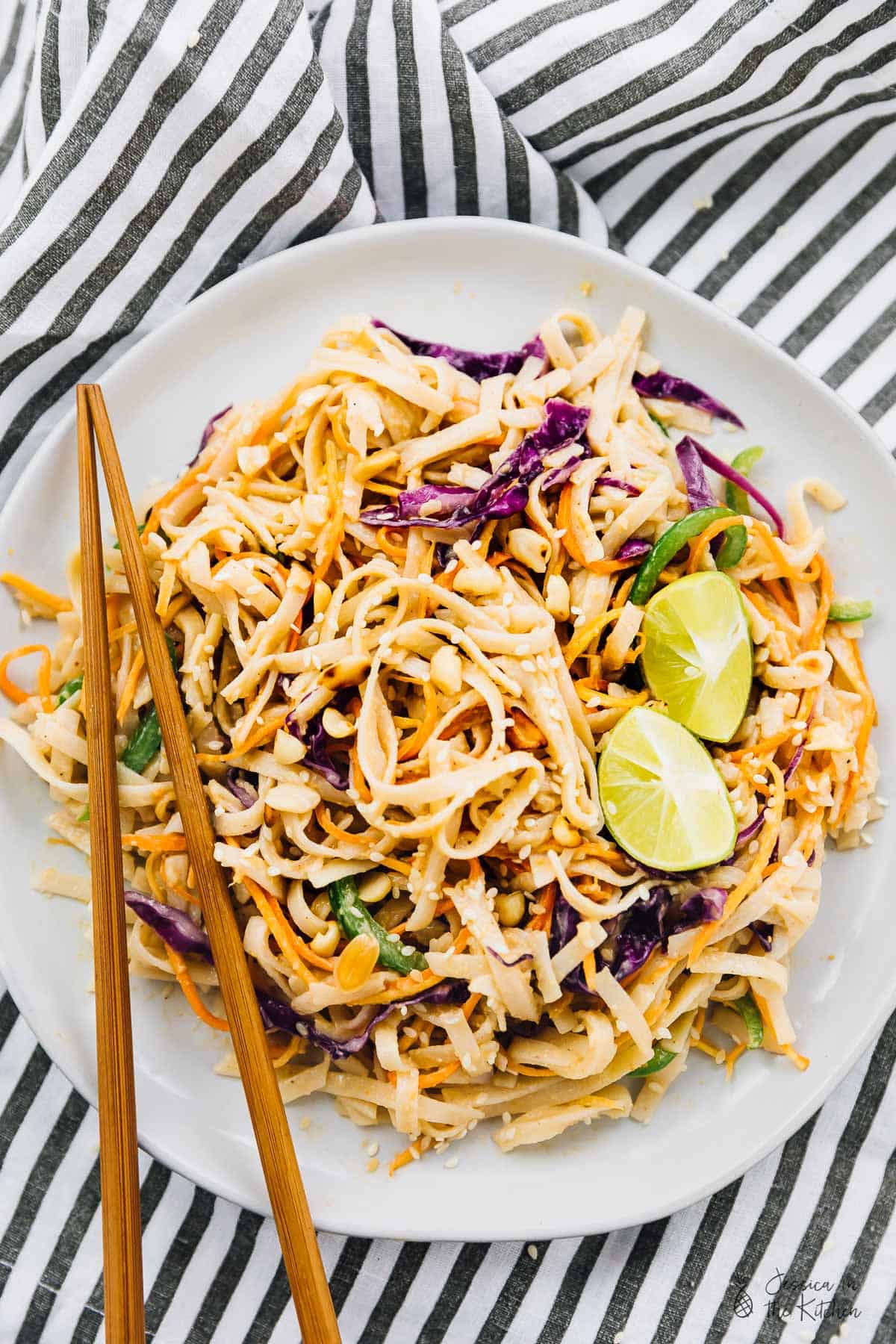 Top down view of asian noodle salad, with chopsticks on the side. 