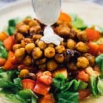 These BBQ Chickpea Wraps are an easy and quick lunch for work or meal on the go! They're swrved with a creamy ranch dressing and very filling! via https://jessicainthekitchen.com