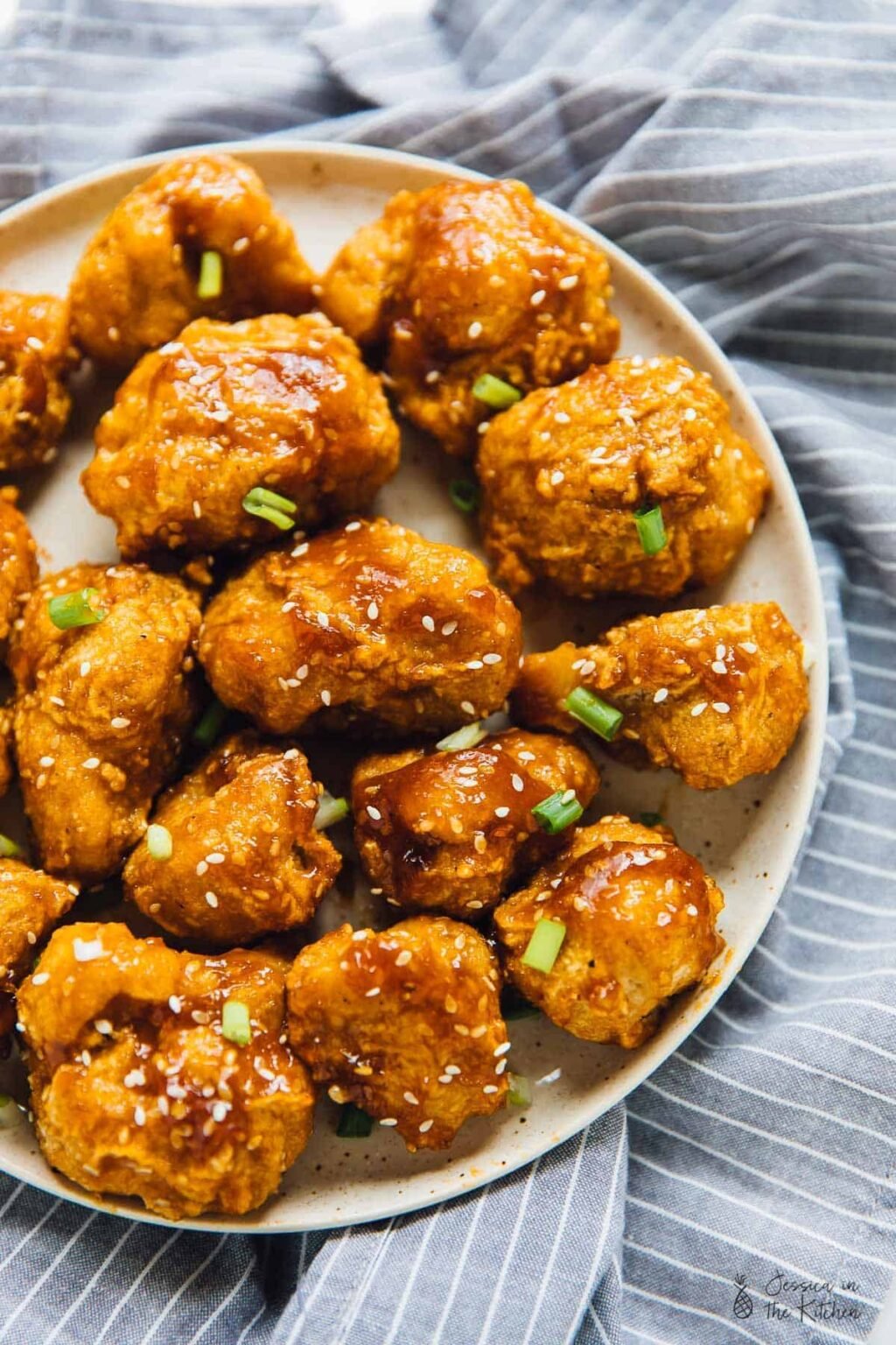 Sweet and Sticky Orange Cauliflower Bites - Jessica in the Kitchen