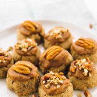 Maple pecan sugar cookies on a white plate.