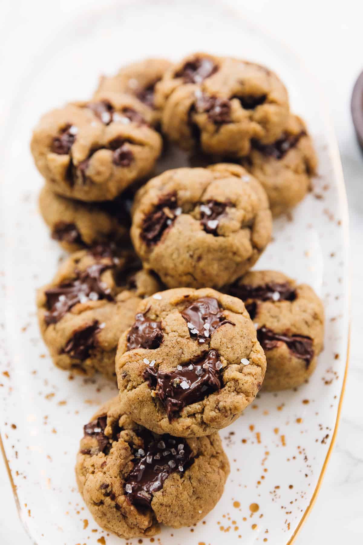 Platter of chewy salted chocolate chip tahini cookies