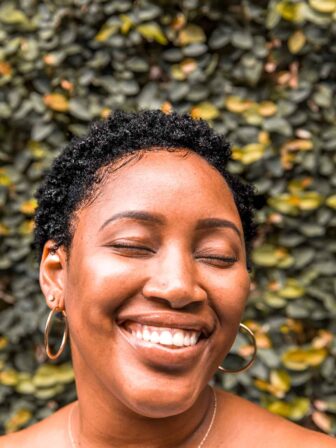 Woman smiling at the camera.