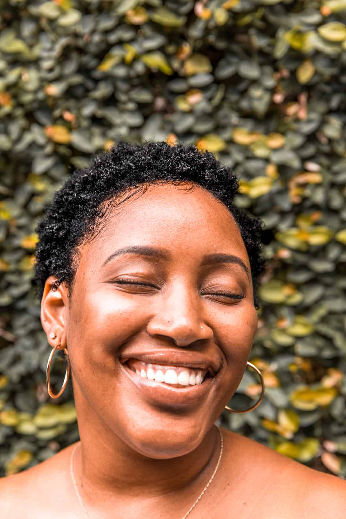 Woman smiling to camera.