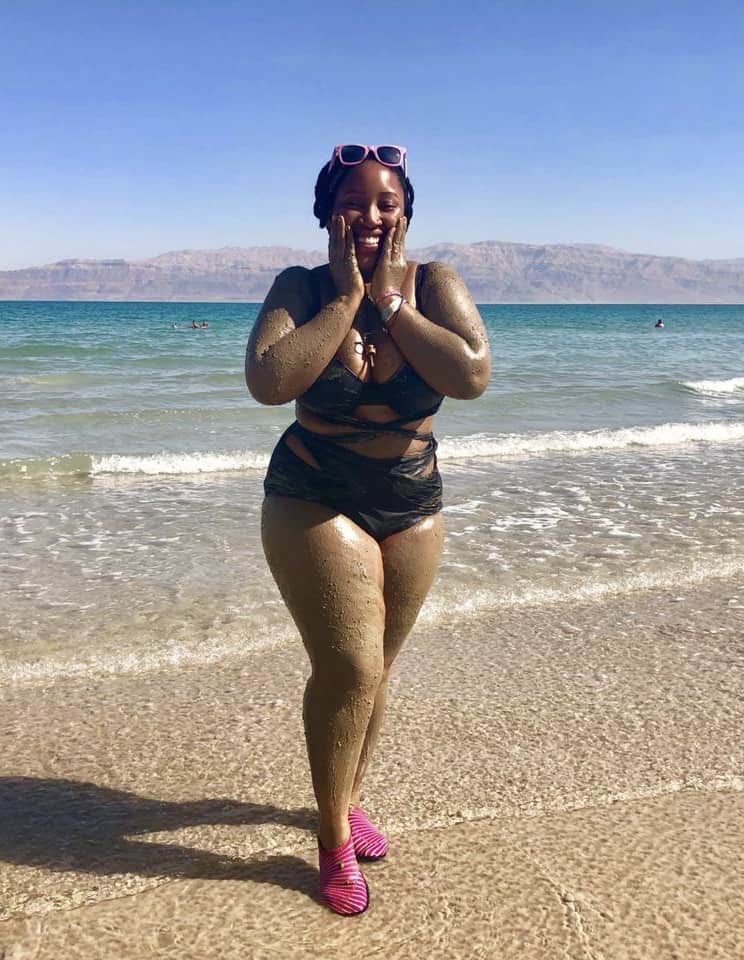 Jessica standing on the beach.