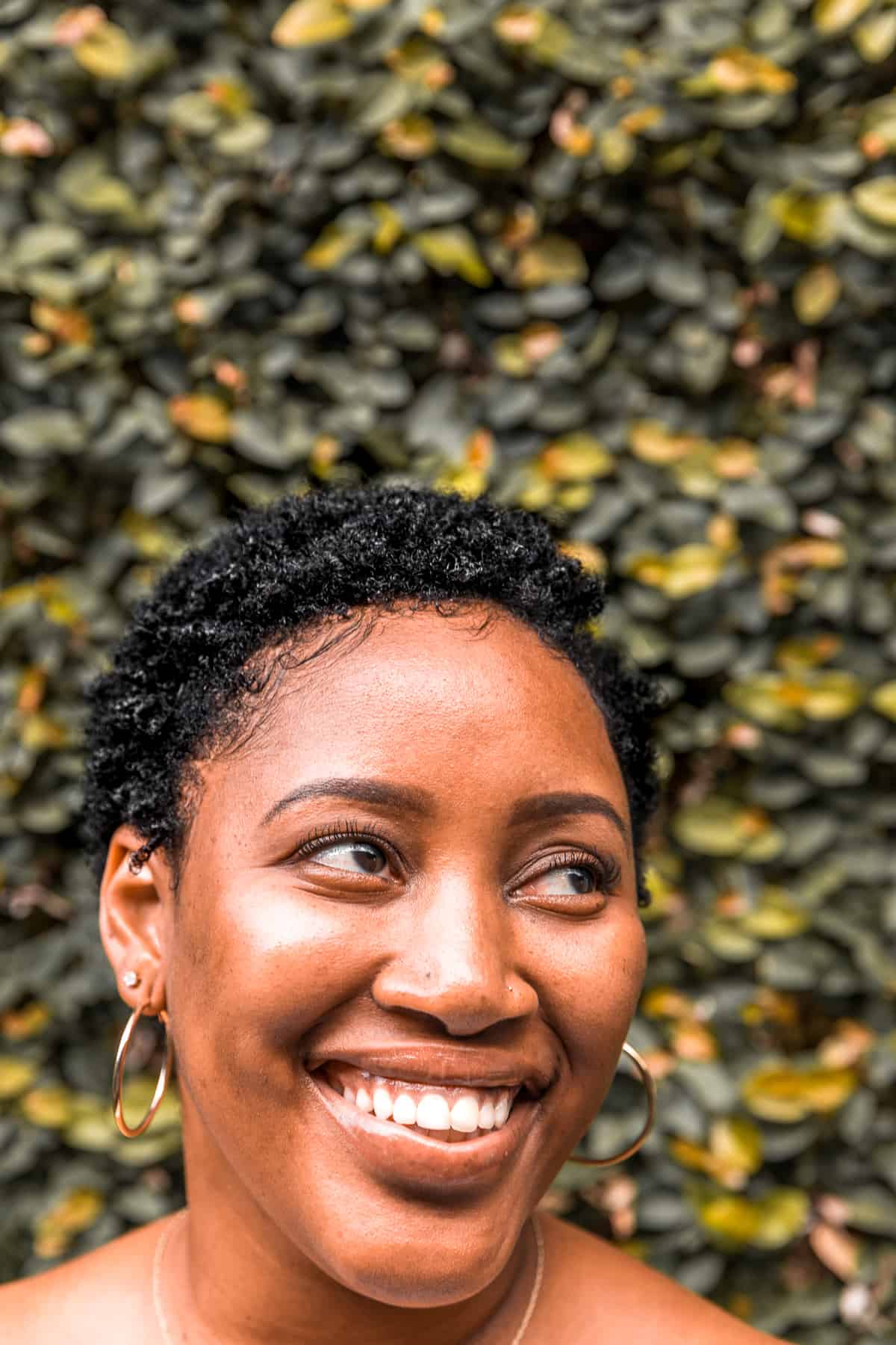 A lady smiling for camera. 