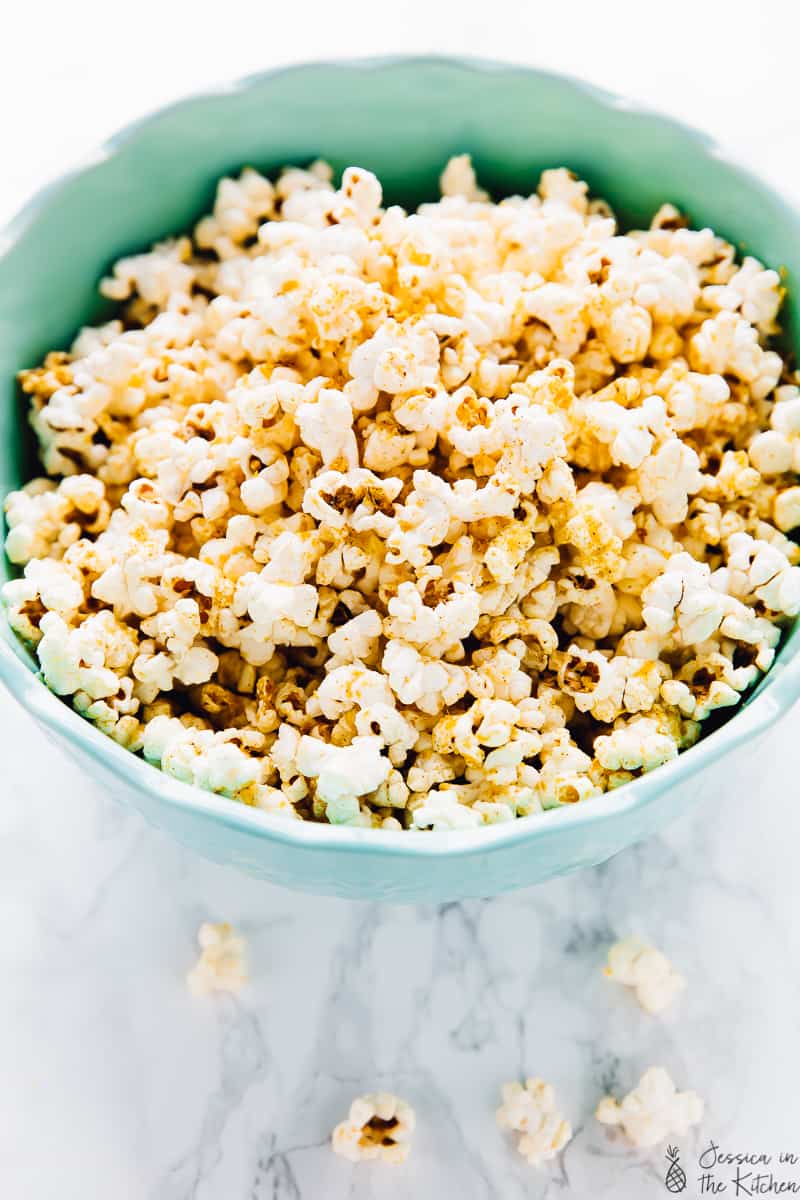 Popcorn in a blue bowl. 