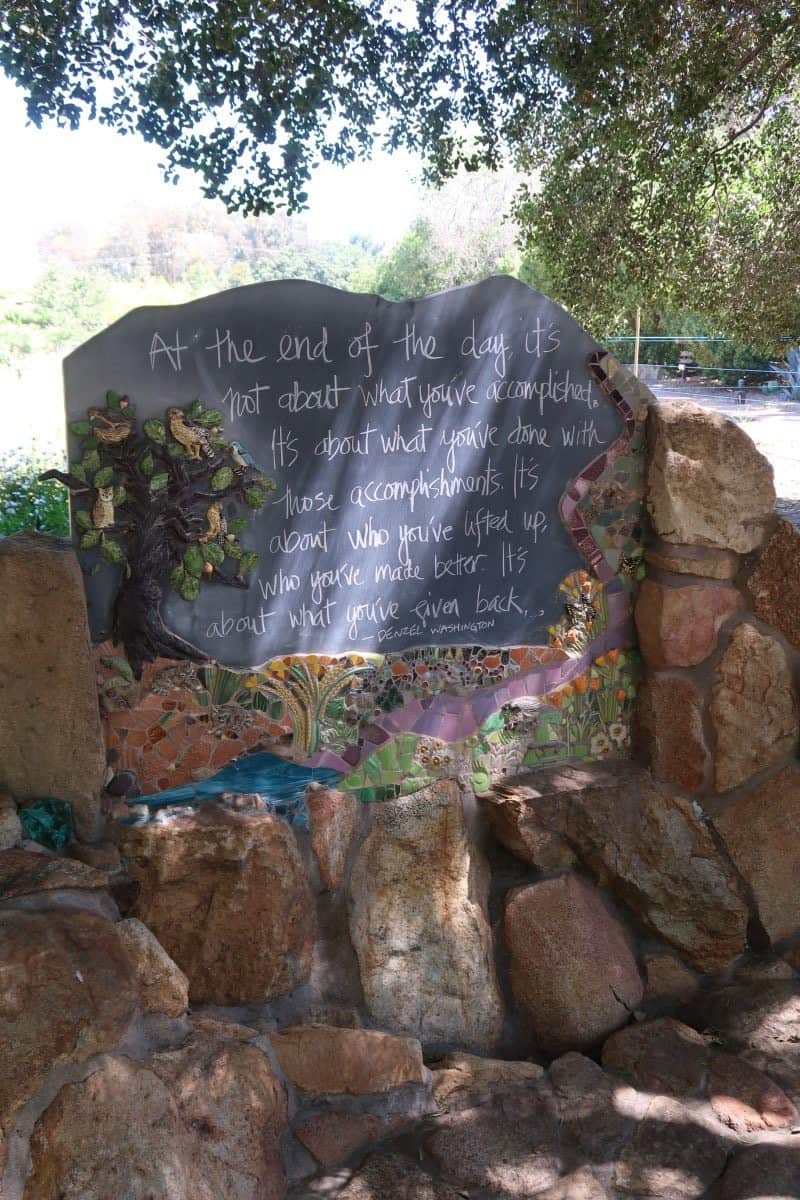 A message written on a rock wall. 