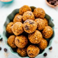 Pumpkin energy bites in a bowl in a flatly photo.