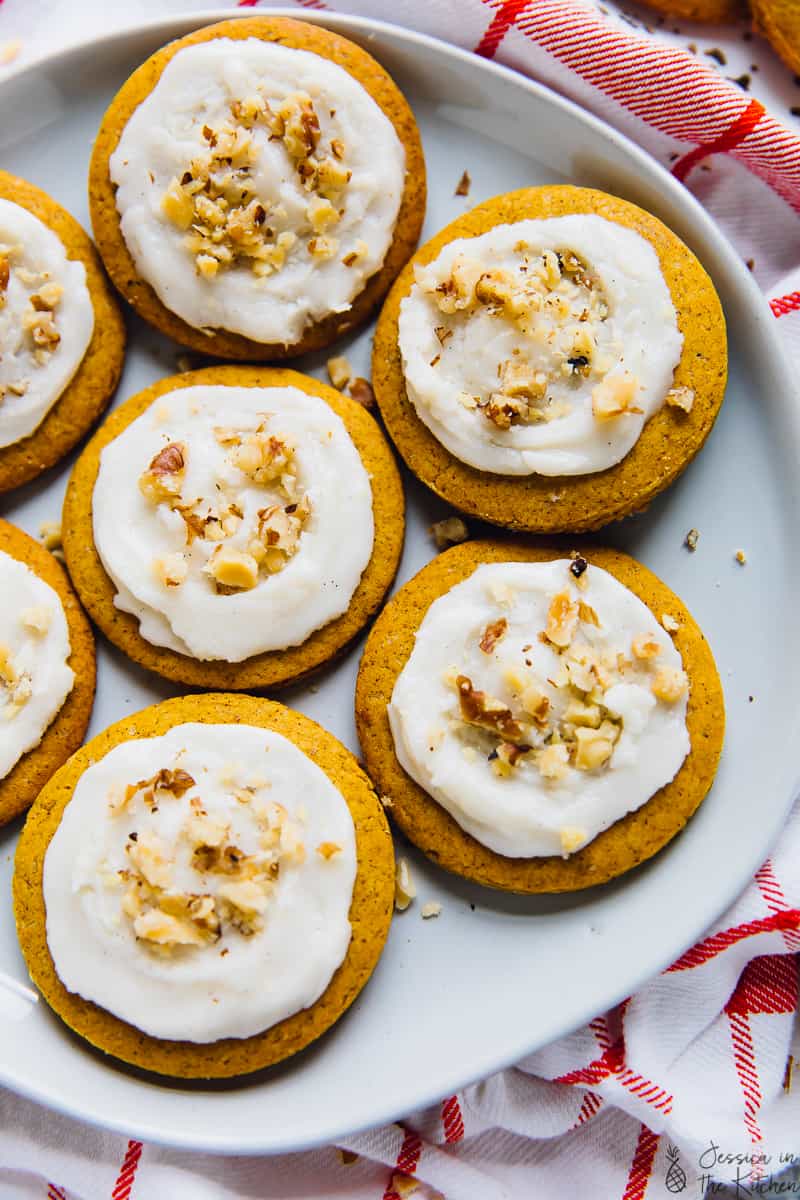 Top down shot of rolled pumpkin spice cookies on a plate. 