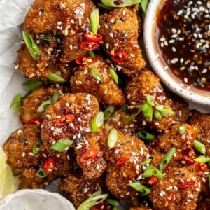 Platter of General Tso cauliflower with bowl of sauce