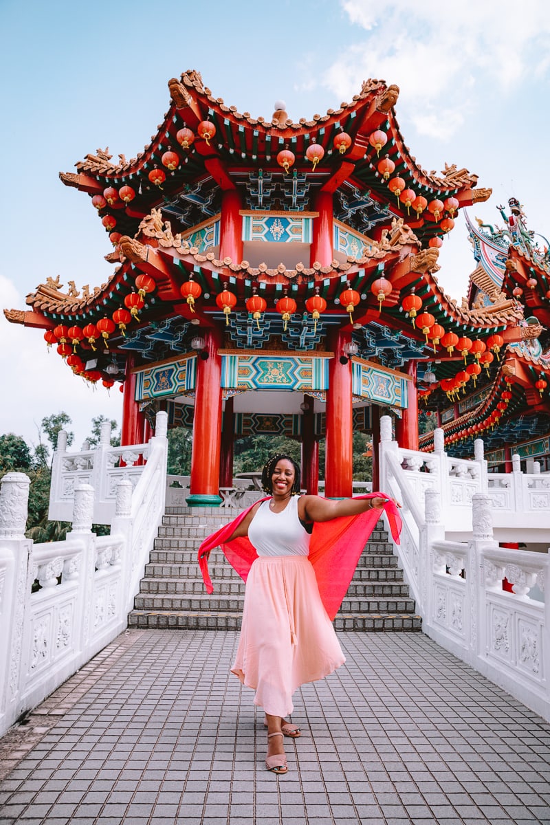 Jessica in front of a pagoda. 