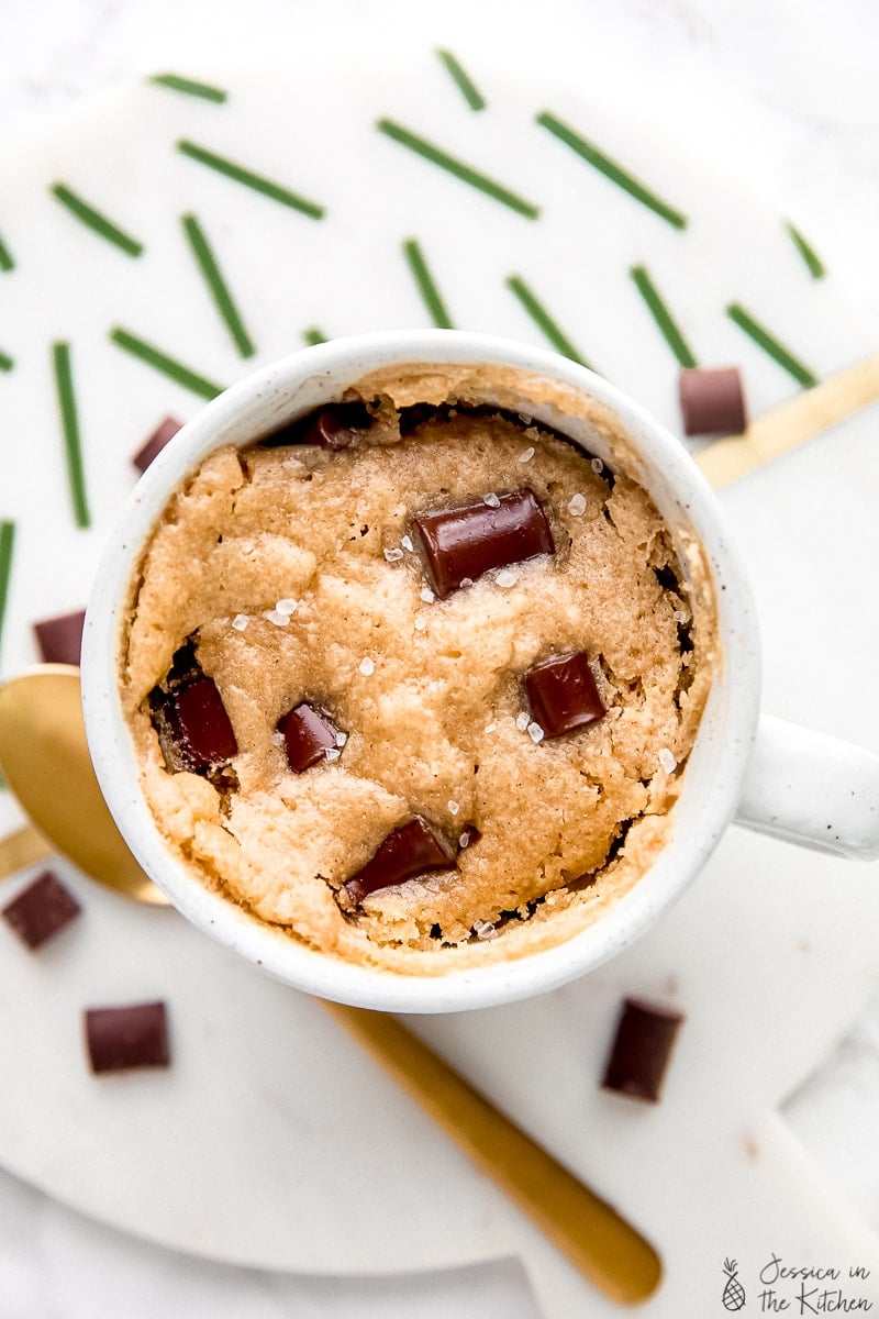 Top down view of chocolate chip tahini mug cake. 