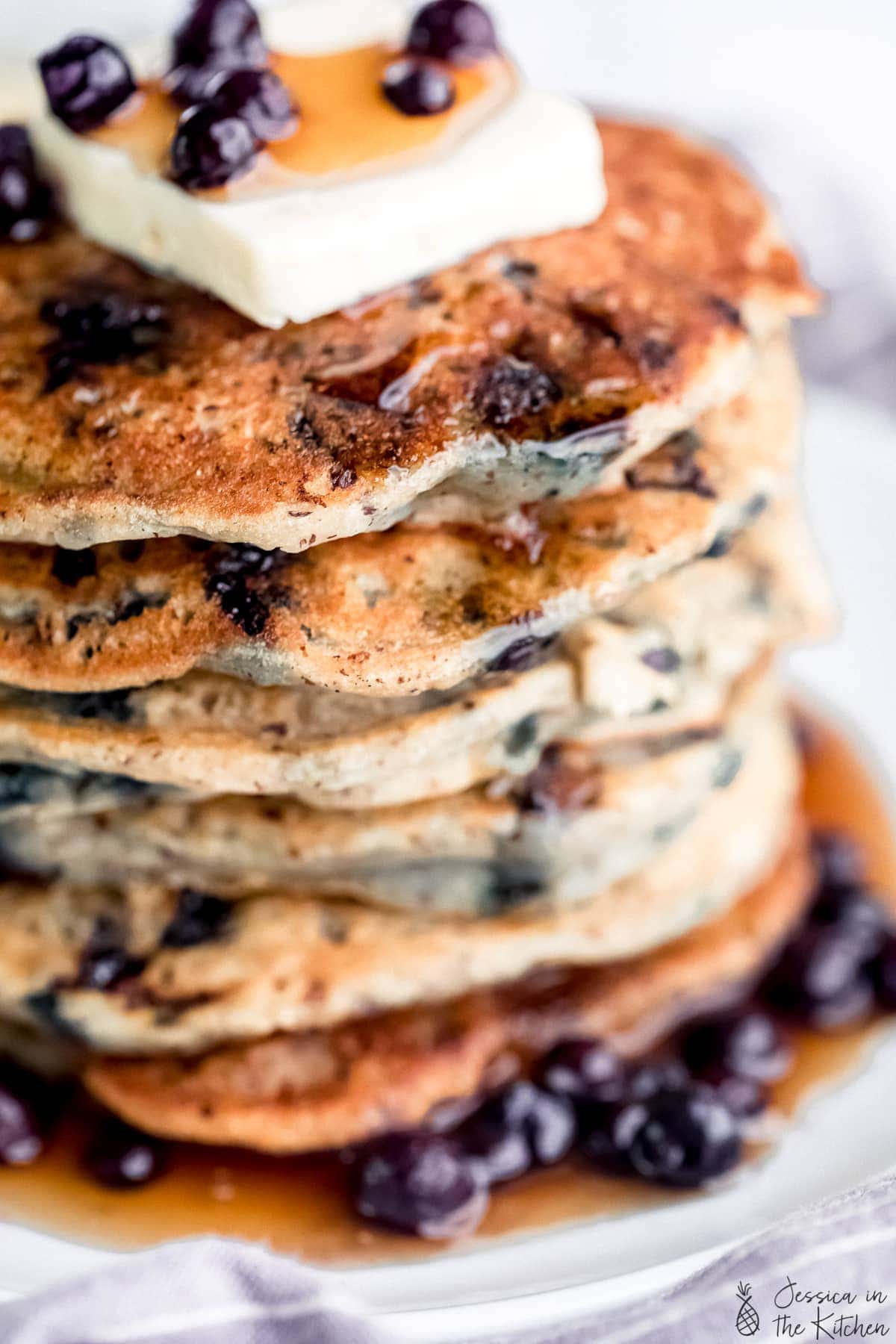 Close up of a stack of vegan pancakes. 