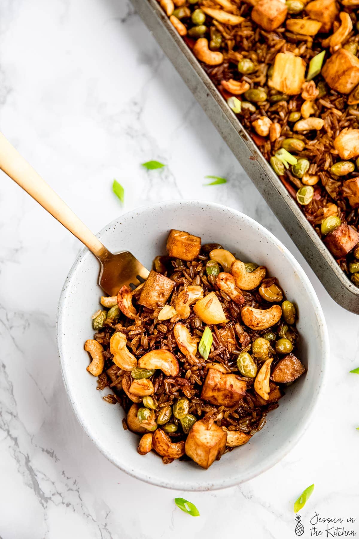 Bowl of vegan fried rice with fork