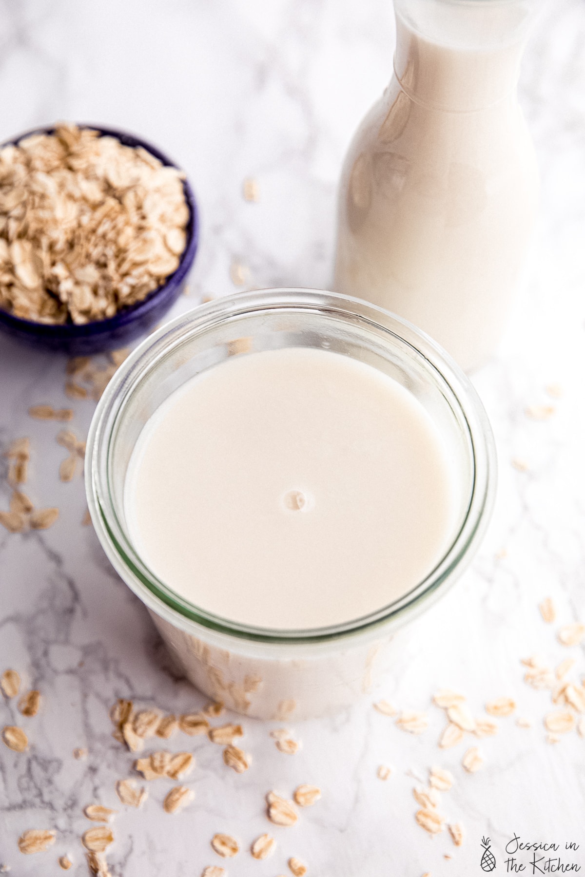 Vegan dairy substitute oat milk in a weck jar birds eye view