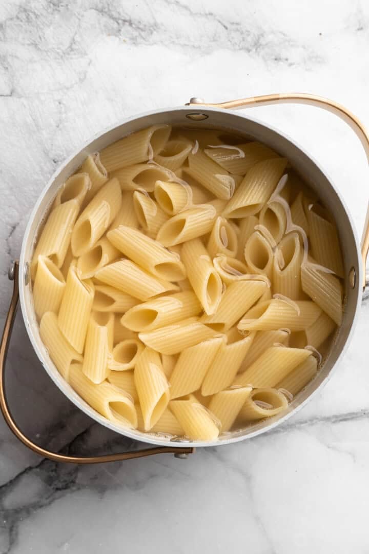 Pasta in pot of water.