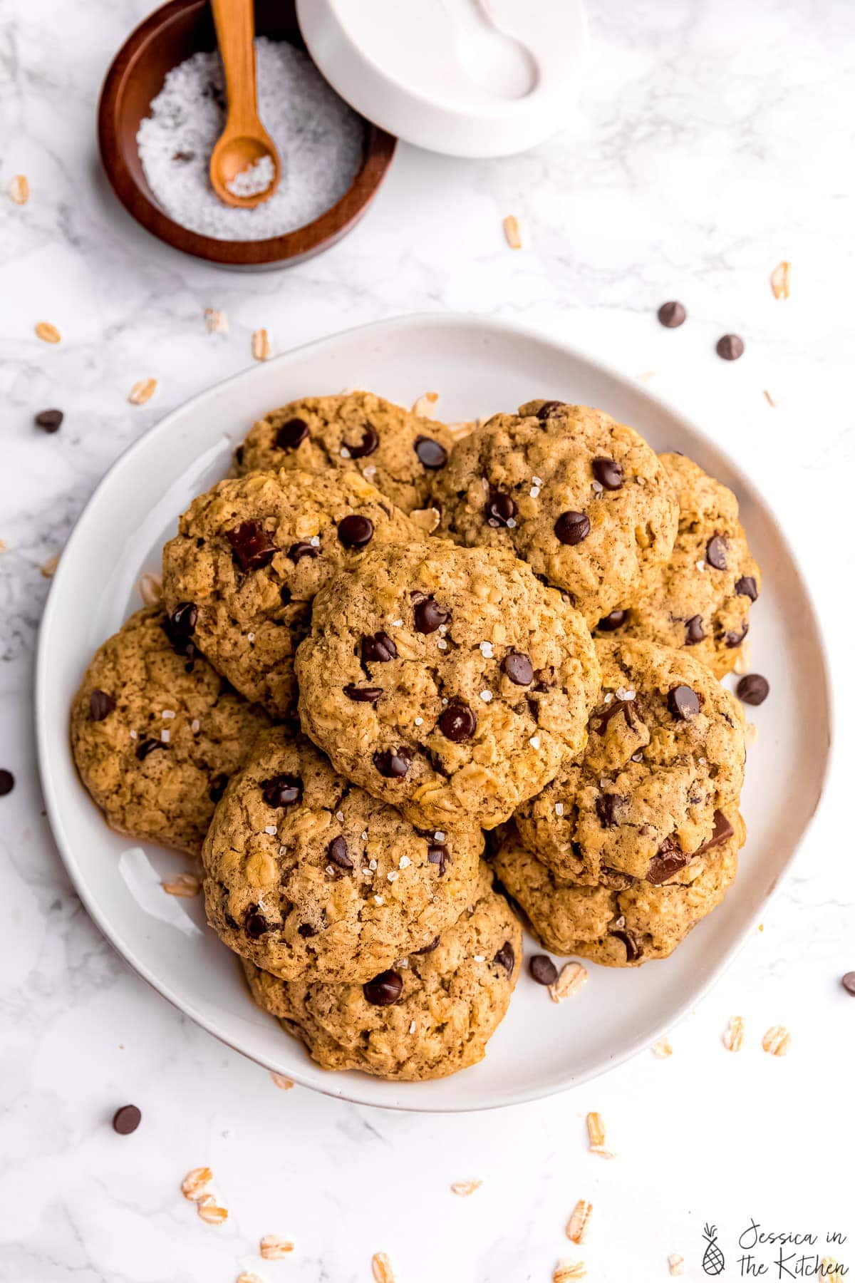 Overhead view of vegan oatmeal chocolate chip cookies on plate