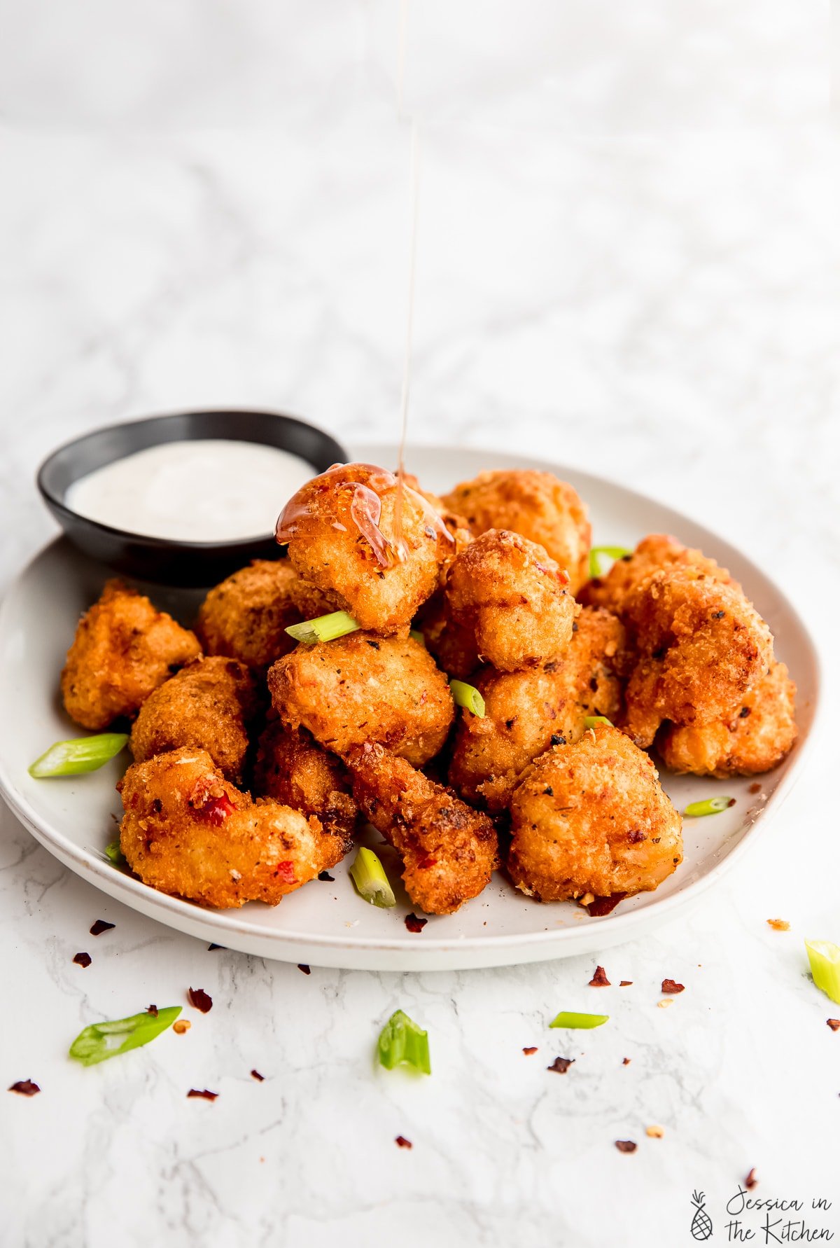 Bang bang cauliflower on a plate.