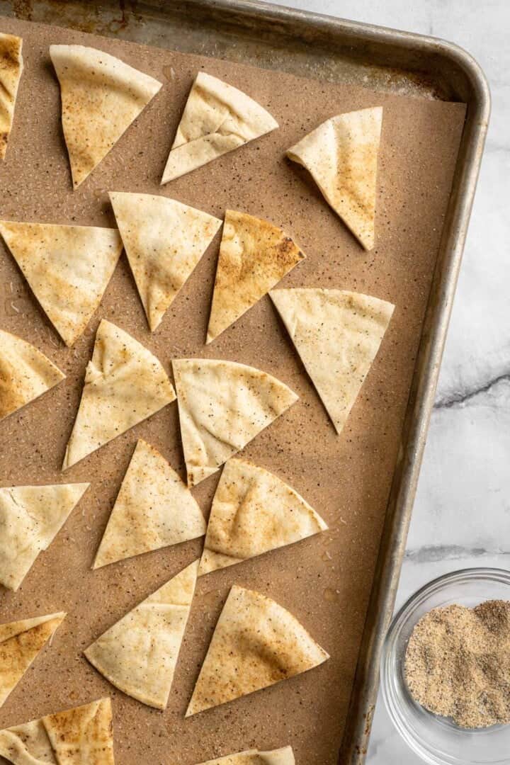 Pitas cut into pieces on sheet pan for making chips.