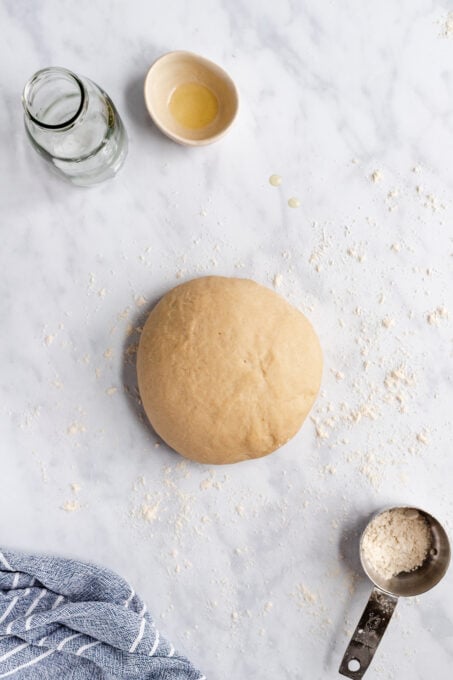 dough rolled into a ball after being kneaded