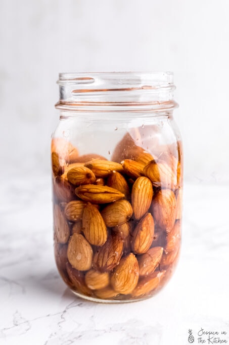 Almonds soaking in jar